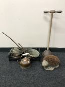 A box containing antique metalware including pans, a kettle,