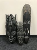 Three carved tribal hardwood masks