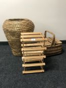 A large wicker laundry basket, together with a picnic hamper,