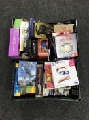 Two boxes containing PC games, computer accessories, MP3 docking station,