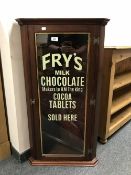 A glazed mahogany hanging corner cabinet - Frys milk chocolate, width 52 cm.