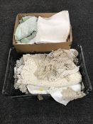 Two boxes containing assorted table linen
