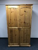 A pine double door wardrobe