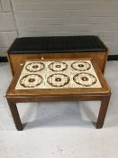 A teak vinyl topped blanket box and a teak tiled topped table
