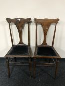 A pair of late Victorian mahogany bedroom chairs