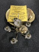 A metal warning notice in multiple languages,