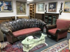 A Barker and Stonehouse chesterfield style shaped backed three seater settee,
