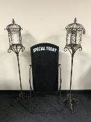 A folding metal cafe specials board,