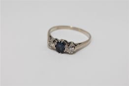 An 18ct gold sapphire and diamond ring