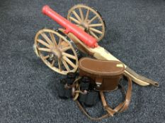 A wooden model of a cannon,