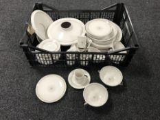 A basket containing Royal Doulton Morning star tea and dinnerware