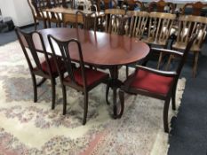 A contemporary inlaid mahogany dining table together with a set of five Queen Anne dining chairs,