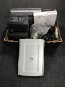 A box containing a Sony Viao laptop with Windows XP, A BT telephone set , computer speakers,