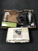 A box containing cased Black and Decker electric planer, a boxed electric engraver, power tools,