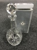 A boxed lead crystal decanter