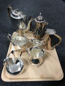 A tray of silver plated wares including a three piece tea set