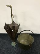 A brass and copper stick stand in the form of an upturned umbrella,