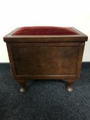 A mahogany storage stool on Queen Anne legs