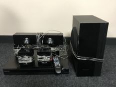 A Samsung DVD player with remote,