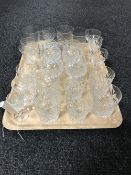 Two trays containing a collection crystal glasses