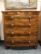 A Victorian mahogany bowfronted five drawer chest,