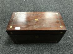 A Victorian rosewood tea caddy