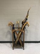 An oak stick stand with tray,