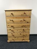 A pine six drawer chest