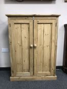 A reclaimed pine two door cabinet,