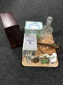 A tray containing a Lladro figure of a bird perched on a tree branch, a Ronson table lighter,