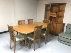 A Sutcliffe teak dining room suite comprising of display cabinet, corner unit, extending table,