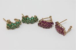 A pair of ruby cluster earrings set in gold,