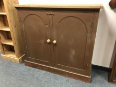 A painted pine double door kitchen cupboard, width 125 cm.