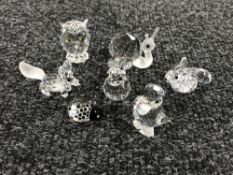 Seven un-boxed Swarovski Crystal figures; owl, snail, two rabbits, fox,