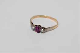 An 18ct gold ruby and diamond ring