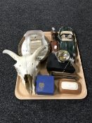 A tray containing a die cast Burago car, Jaguar, boxed pewter Celtic bowl, animal skull,