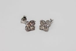 A pair of 18ct white gold diamond earrings