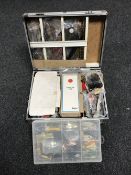 An aluminium case containing fly making equipment,