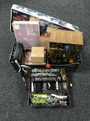 A box containing DIY accessories, including motors, fuses, nails, vice, model kit,