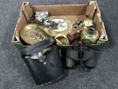 A box containing cased binoculars, a German pottery vase, miniature tankards, brass ware,