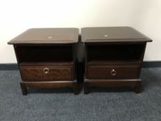 A pair of Stag bedside stands fitted a drawer,