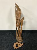 A carved Eastern figure,