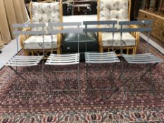 Four folding metal garden chairs