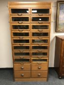 An early twentieth century haberdashery multi drawer chest of twenty drawers, width 91 cm,
