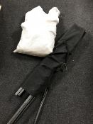 A folding gazebo in carry bag