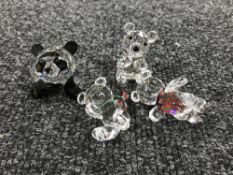 Four un-boxed Swarovski Crystal figures;