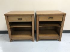 A pair of bedside stands fitted a drawer with brass drop handles