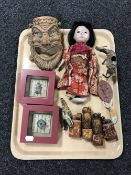 A tray containing a twentieth century Japanese doll, carved marble figures,