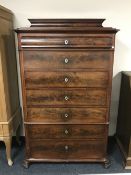 A nineteenth century mahogany seven drawer chest on paw feet CONDITION REPORT: