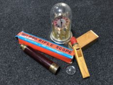 A box containing a telescope with brass mounts, together with a boxed Milbro rifle scope,